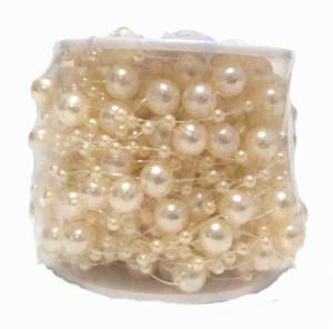 Pärlor på tråd med champagnefärgade pärlor. 15 m