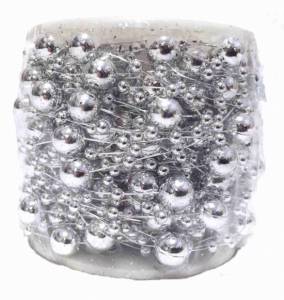 Pärlor på tråd med silverfärgade pärlor. 15 m