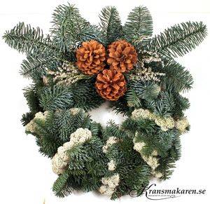 Varvad krans med kottar & risp