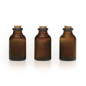 Liten glasflaska med brunt glas och kork