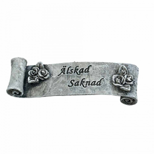 Banderoll med texten Älskad Saknad