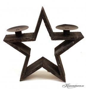 Stjärnformad ljushållare för 2 ljus. Grå. 25 x 7,5 cm