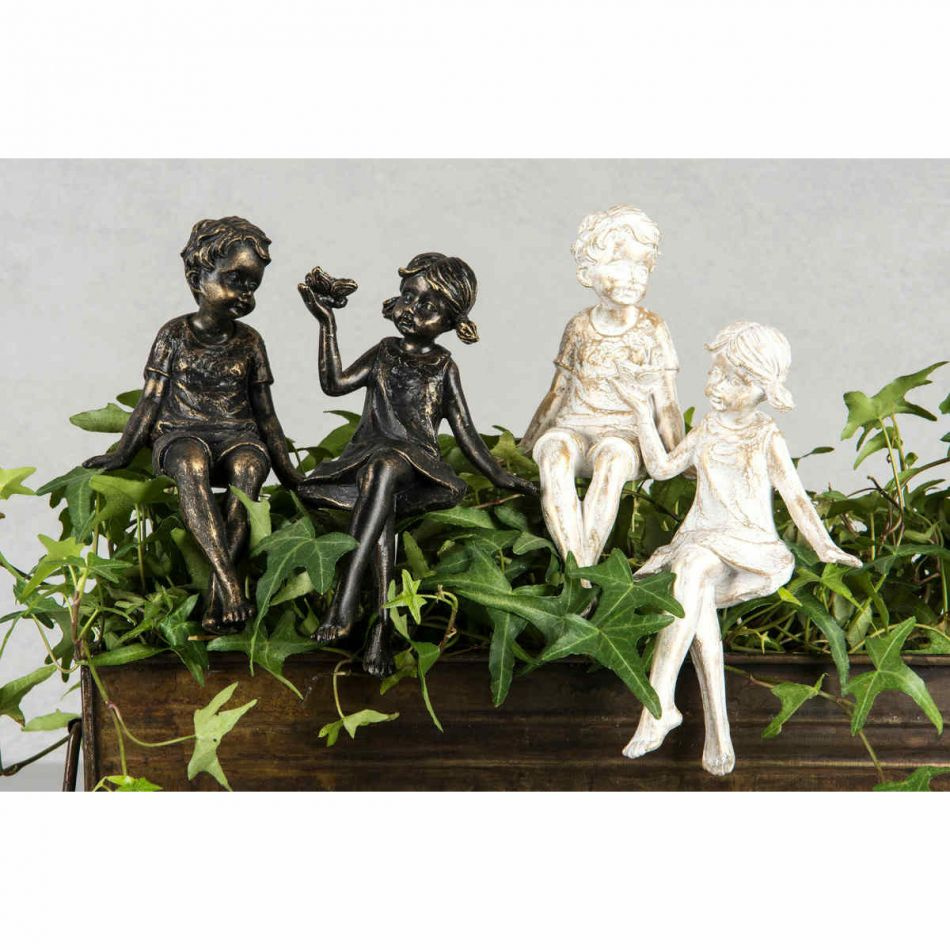 Pojke och flicka, sittande, shabby vit, ca 15 cm.