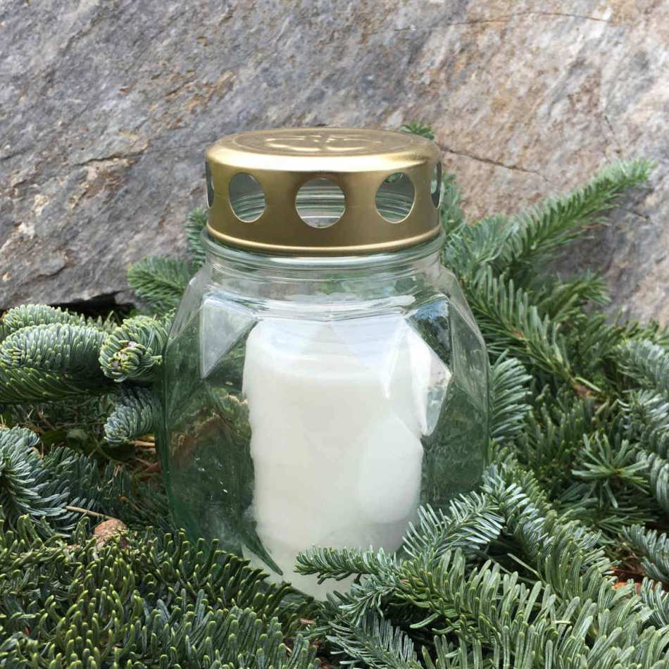 Gravlykta av glas med guldlock. Brinntid ca 48h
