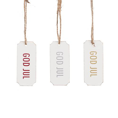 Etiketter med texten God Jul. 3 st i olika färger