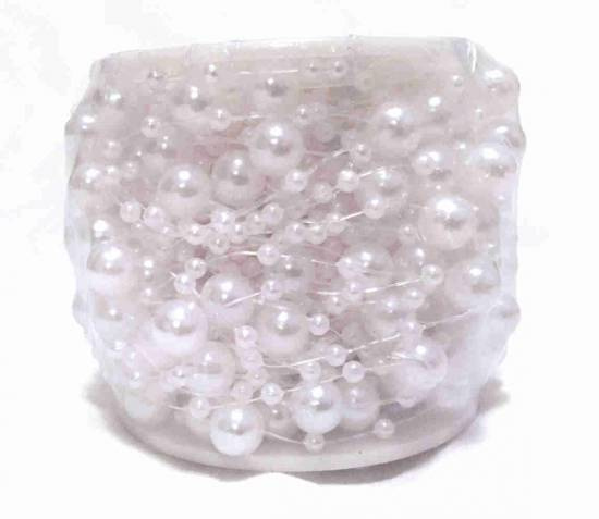 Pärlor på tråd med vita pärlor. 15 m