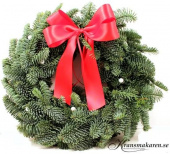 Krans med vita pärlor och röd rosett Krans med vita pärlor och röd rosett