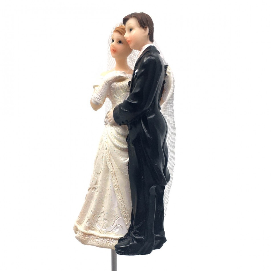 Brudpar, 8 x 4.5 cm. Brud vänster