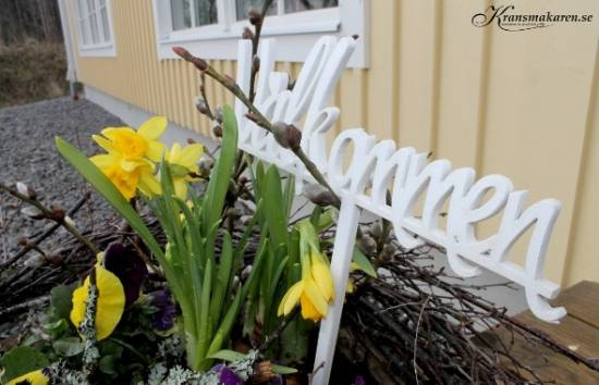 Välkommen skylt  pinne, kursiv text, vit  18 x 7 cm