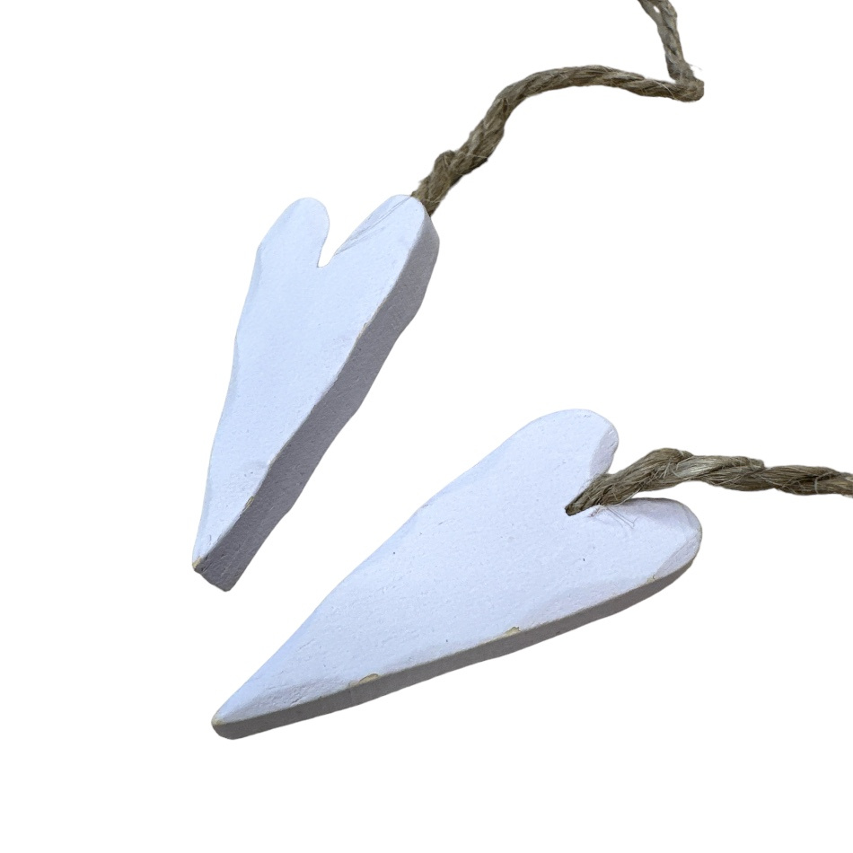 Hjärtan 2 st på natursnöre. Ljuslila