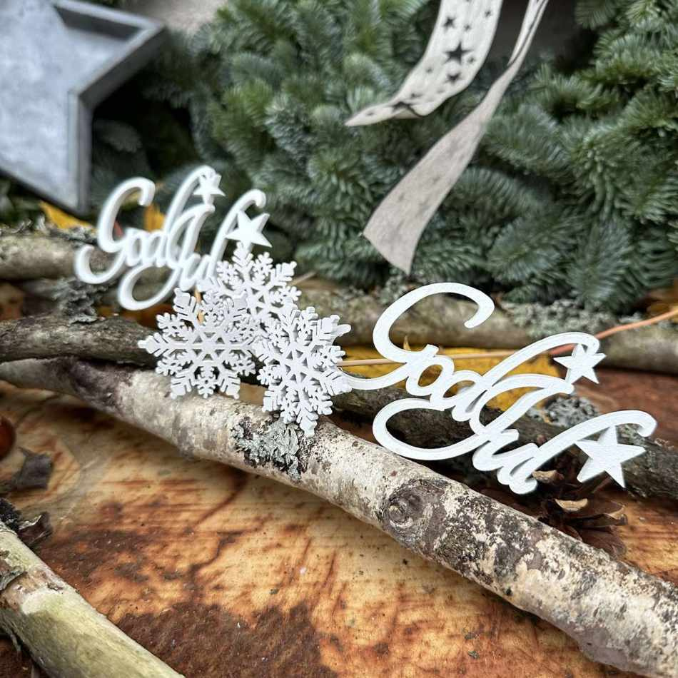 Snöflinga på pinne. ca 4 cm