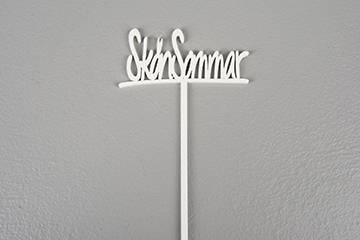 Träskylt med texten skön sommar