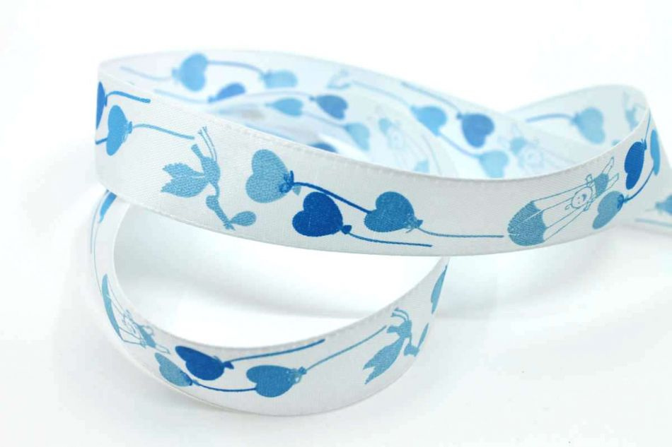 Band med blå figurer, 25 mm bred. ( 3 meter )