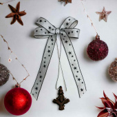 Rosett av linne med Svarta stjärnor , ca 15cm Rosett av linne med Svarta stjärnor , ca 15cm