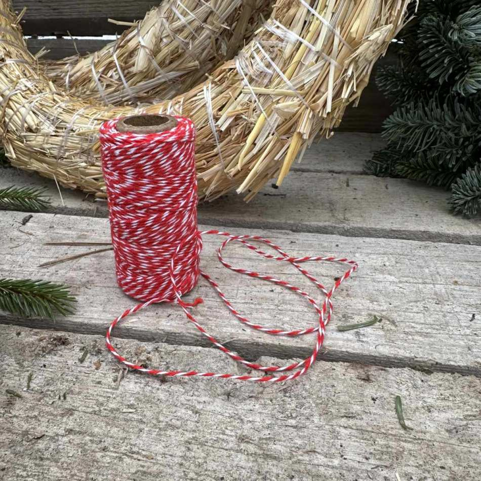 Presentinslagning med bomullssnöre